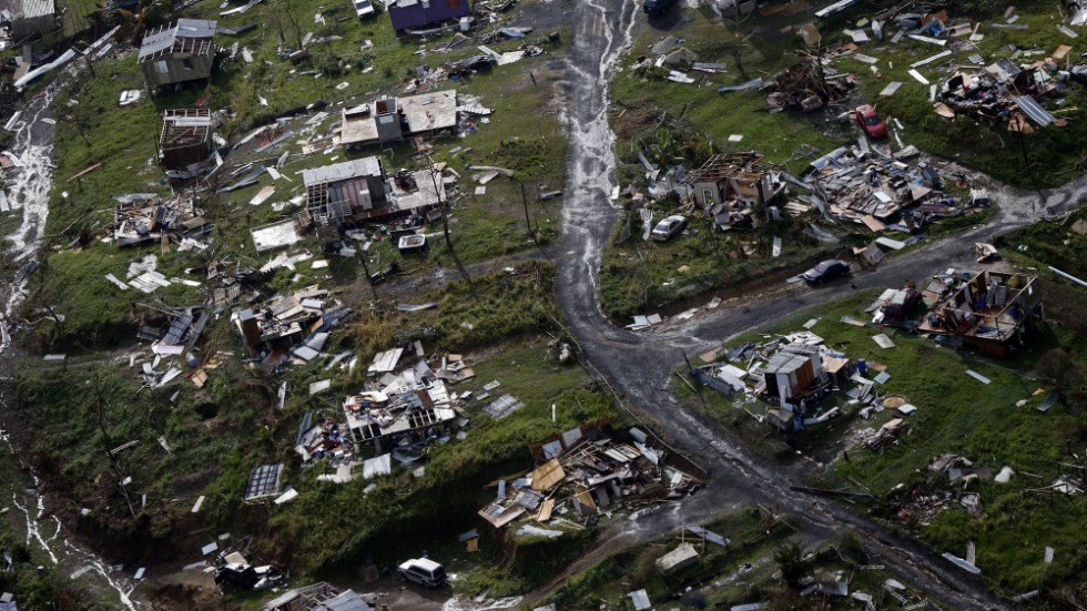 Samhällen förstörs i naturkatastrofer med koppling till extrema väderhändelser. Bilden är från Puerto Rico, där runt 3|000 människor omkom under orkanen Maria 2017. Arkivbild.