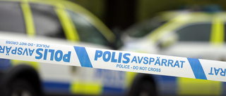 Två anhållna för skott mot polis