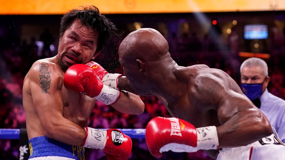 Manny Pacquiao, till vänster, förlorade mot Yordenis Ugas.