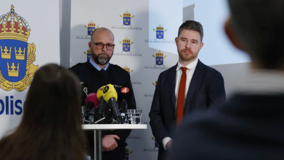 Andreas Pallinder, utredningschef vid Uppsalapolisen och åklagare Erik Grönvall vid torsdagens presskonferens i Uppsala.
