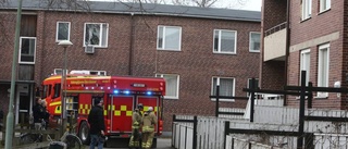 Larm om brand i flerfamiljshus