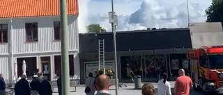 Matbutik utrymd efter brand i fläktskåp