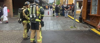 Larm om kabelbrand vid matmarknaden