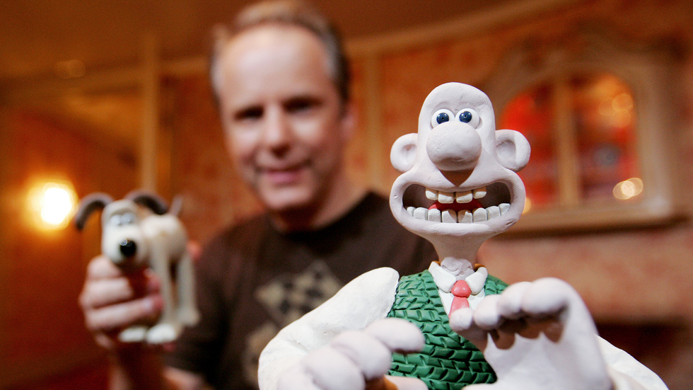 Animatören Nick Park med sina skapelser Wallace och Gromit. Arkivbild.