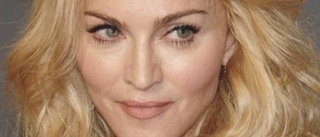 Madonna skriver nytt till samlings-cd