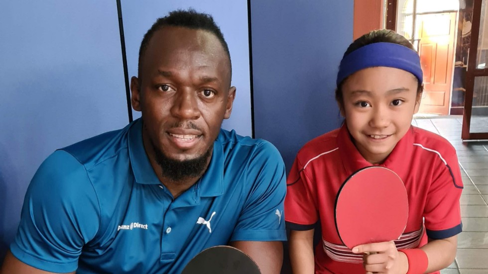 Laurynne Cabardo tillsammans med Usain Bolt under reklaminspelningen.