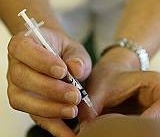 Vaccinationsplan för länet dröjer