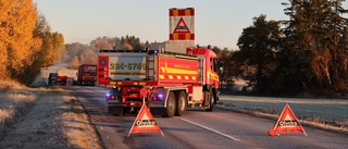 Lastbilssläp fattade eld mitt på vägen