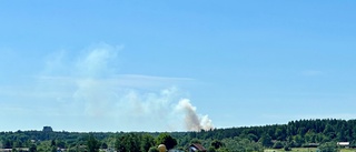 Skogsbrand i Lunsen fick släckas med vattenbombning